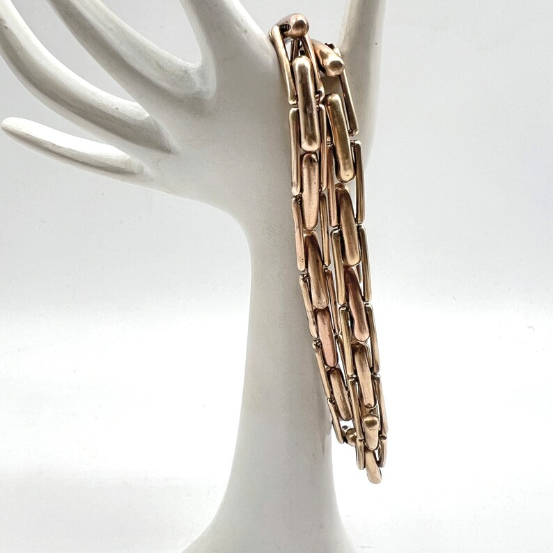 Lambourne Shirt Sleeve Holders. Vintage Yellow Gold Metal Expanding