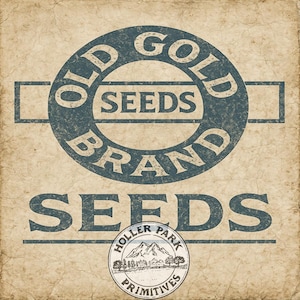 May include: Vintage-style sign with the text "OLD GOLD SEEDS BRAND" in a circular design, and "SEEDS" below. A smaller circular emblem reads "HOLLER PARK PRIMITIVES" with a mountain scene. The background has a textured, aged appearance.