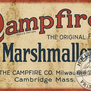 May include: Vintage-style sign for Campfire Marshmallows. The sign features the words "Campfire Marshmallows" in red and blue lettering, with the text "The Original Food" above the word "Marshmallows". The sign also includes the text "By The Campfire Co. Milwaukee Wis Cambridge Mass."