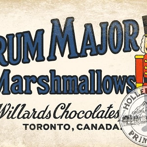 May include: A retro advertisement for "Drum Major Marshmallows" by Willards Chocolates, Toronto, Canada. The design includes blue text, a nutcracker illustration, and a circular logo with a mountain and tree scene.
