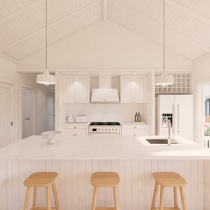 May include: A bright, modern kitchen with white cabinetry, countertops, and appliances. The kitchen island features three wooden stools. Overhead, two pendant lights hang above the island. The room has a vaulted ceiling and a window overlooking a backyard.