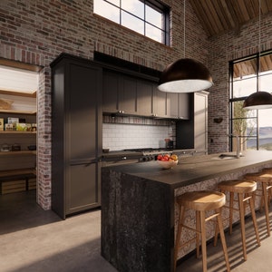 A rustic, industrial shaker style kitchen in dark cabinetry with a white subway tile splashback. The walls are reclaimed brick and the floors are polished concrete. A massive island bench in dark marble is the central focus of the kitchen.