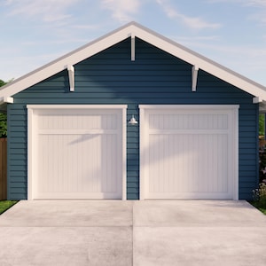 May include: A two-car garage with a navy blue exterior and white trim. The garage doors are white, and a small light fixture is mounted between them. The roof is white, and the driveway is concrete.