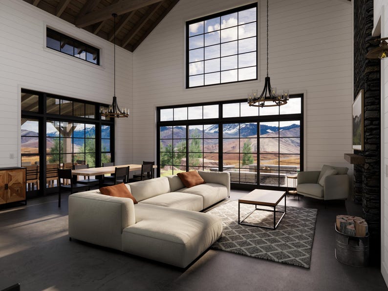 May include: A spacious living room with large windows offering a scenic mountain view. Features a cream-colored sectional sofa, a square coffee table, and a patterned rug. The room is illuminated by chandeliers and natural light.
