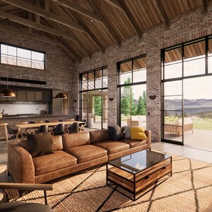 Interior shot of Mill Farm design by Turnervisual. This living space has reclaimed brick walls, exposed wood trusses and large steel windows that offer incredible views to the surrounding landscape.