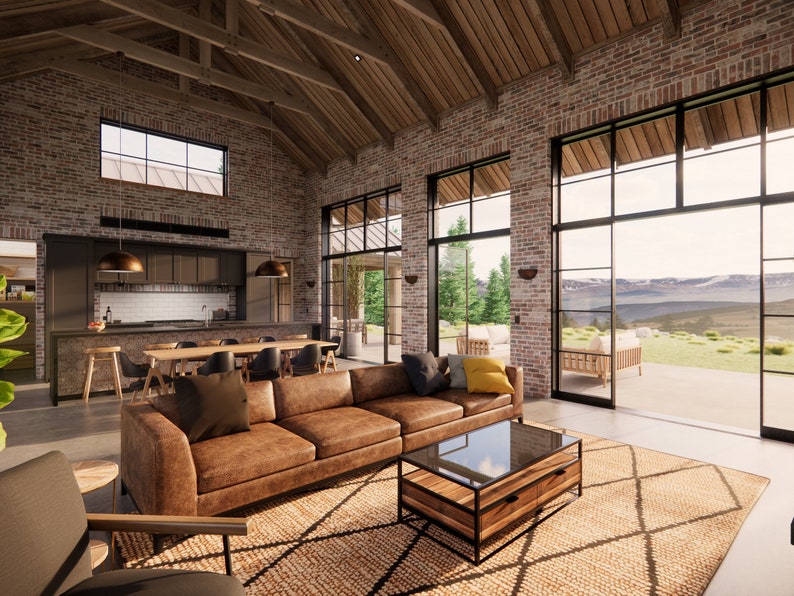 Interior shot of Mill Farm design by Turnervisual. This living space has reclaimed brick walls, exposed wood trusses and large steel windows that offer incredible views to the surrounding landscape.