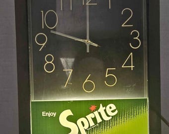 Vintage "Enjoy Sprite" Lighted Wall Clock from the 1960's or 1970's