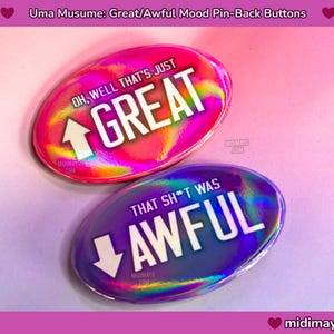 May include: Two oval pin-back buttons with holographic surfaces. One is pink and says "OH, WELL THAT'S JUST GREAT" with an upward arrow. The other is purple and says "THAT SH*T WAS AWFUL" with a downward arrow. The buttons are for expressing moods.