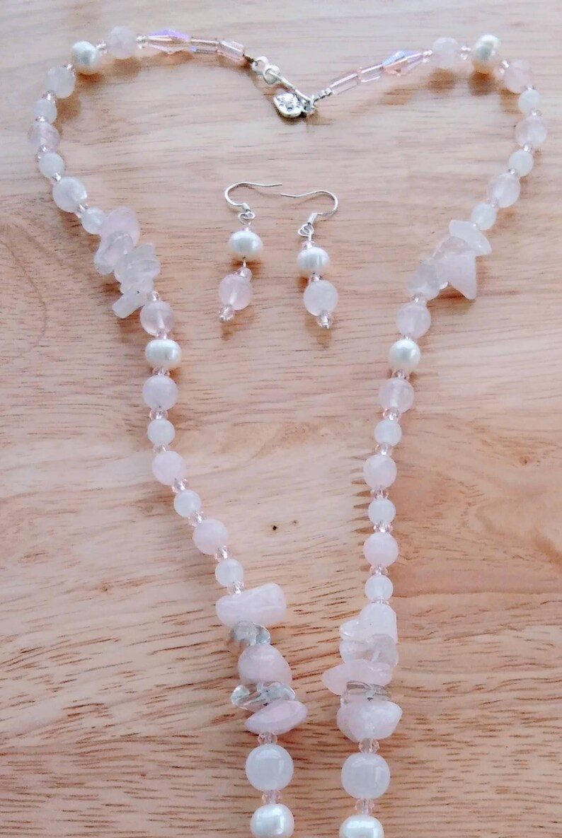Carved Cameo qrtz and German crystal set in .925 sterling silver with faceted Rose Quartz mother of pearl swarovsky crystal pink qrtz