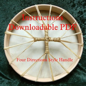 May include: A close-up of a wooden frame drum with a natural leather head. The drum is being laced with a natural fiber cord. The text "Instructions Downloadable PDF" and "Four Directions Style Handle" is printed in red on the drum.