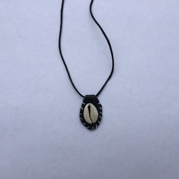 Necklace/pendant with cowry shell on black leather