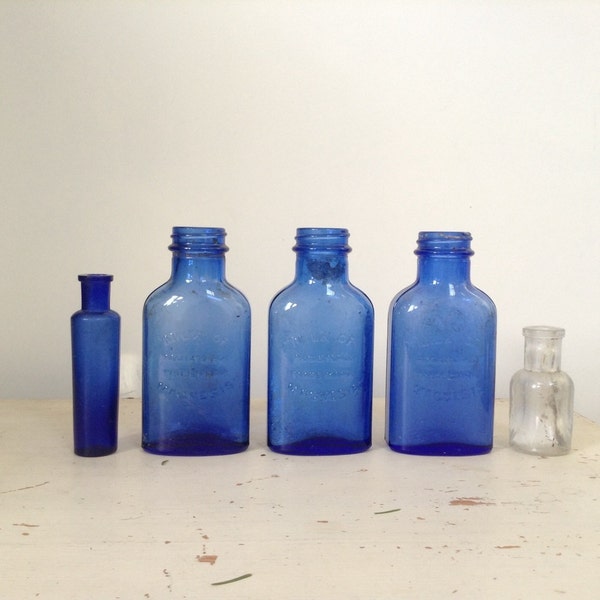 Vintage chemist bottles, blue apothecary bottles, milk of magnesium, glass bottles