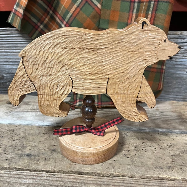 Wood bear for lodge decor. Solid cherry wood on walnut spindle. Carved fur on both sides. Mantel, table or shelf decor. Wildlife.