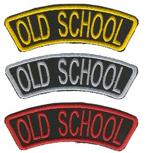 May include: Three embroidered patches with the text "OLD SCHOOL". The top patch has yellow lettering and trim on a black background. The middle patch has silver lettering and trim. The bottom patch has red lettering and trim.