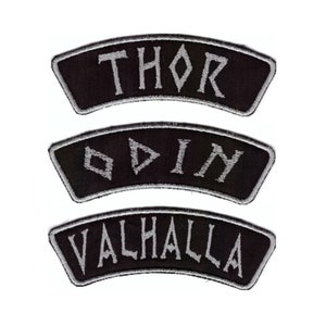 May include: Three black fabric patches with white embroidered text. The patches read "THOR", "ODIN", and "VALHALLA".