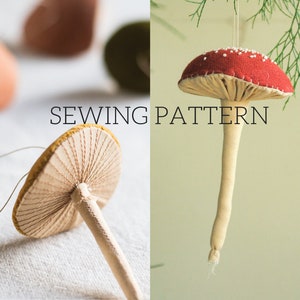 May include: Sewing pattern for a mushroom shaped ornament. The pattern includes a red and white mushroom with white spots and a yellow mushroom with a brown stem.