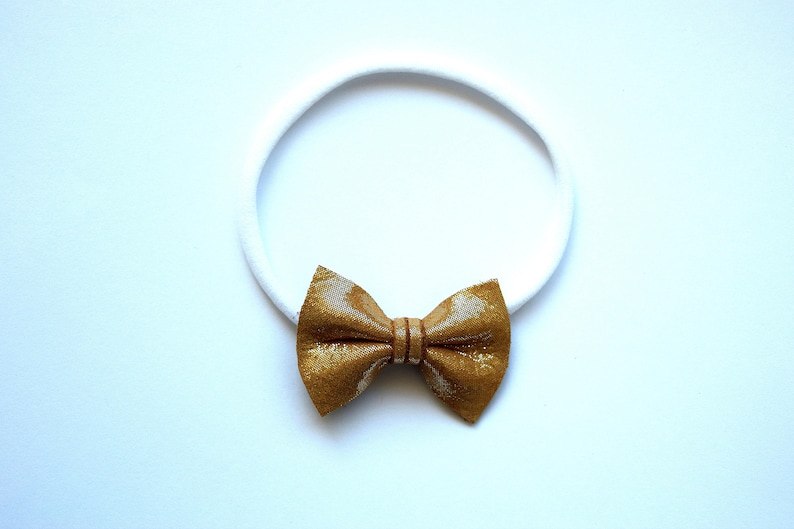 Sunkissed Metallic TINY Leather Bow Headband Photo Prop for Girls Adorable Holiday Bow for Little Girls Babies Toddlers Adults Holiday Bow