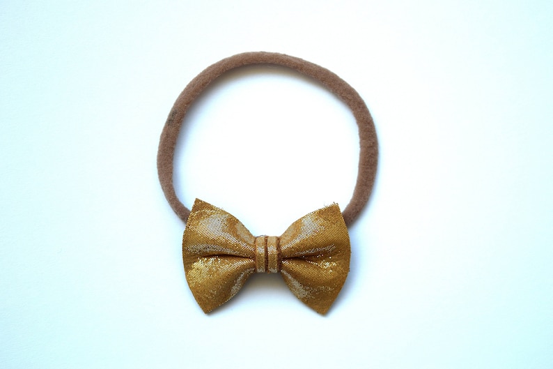 Sunkissed Metallic TINY Leather Bow Headband Photo Prop for Girls Adorable Holiday Bow for Little Girls Babies Toddlers Adults Holiday Bow