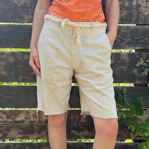 Distressed Big E Levi’s Patched Cutoff Shorts