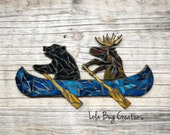 Bear and Moose in a Canoe glass mosaic