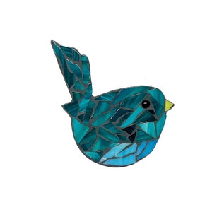 May include: A blue and green mosaic bird with a yellow beak. The bird is made of small pieces of glass and is a unique and colorful piece of art.