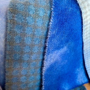 four hand dyed blue wools, each a different texture and hue