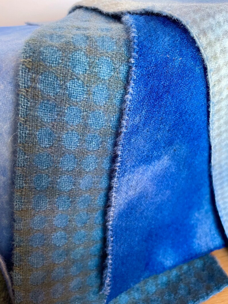 four hand dyed blue wools, each a different texture and hue