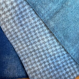 houndstooth over dyed wool dyed blue and a blue plaid wool fabric