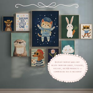 May include: A collection of framed art prints featuring whimsical animal illustrations. The artwork includes a bear in a cowboy hat, a cat in a spacesuit, a rabbit with a carrot, and a tiger on a skateboard. The prints are displayed on a blue wall.
