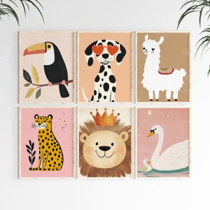 May include: Set of six framed art prints featuring whimsical animal illustrations. Includes a toucan, Dalmatian with heart-shaped glasses, llama, cheetah, lion with a crown, and a swan with a duckling. Each print has a soft color palette and a playful design.