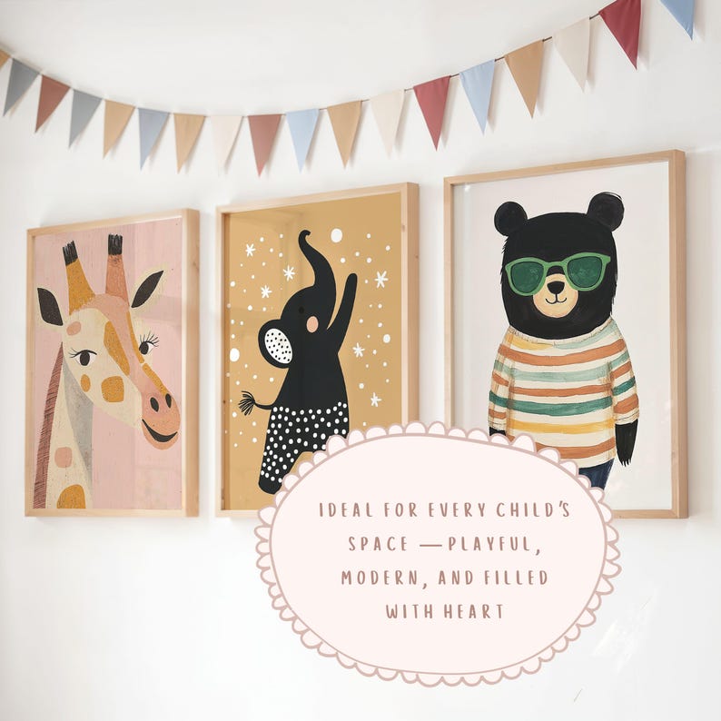 May include: Three framed animal art prints: a giraffe, an elephant, and a bear wearing sunglasses. The giraffe is on a pink background, the elephant on a mustard background, and the bear on a white background. A colorful banner hangs above the prints.
