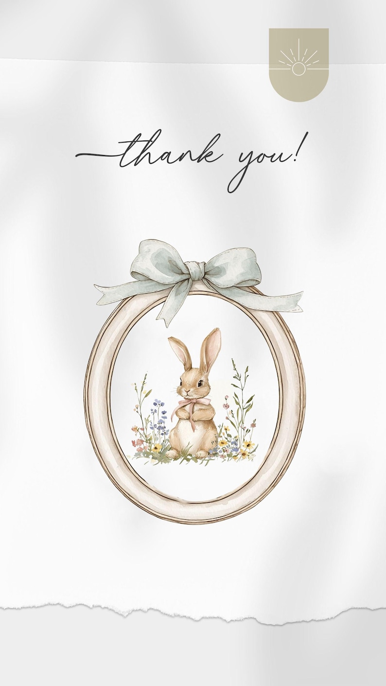 May include: A thank you card featuring a watercolour illustration of a brown bunny rabbit sitting in a field of flowers. The bunny is holding a pink flower in its paws. The illustration is surrounded by a light brown oval frame with a blue ribbon.