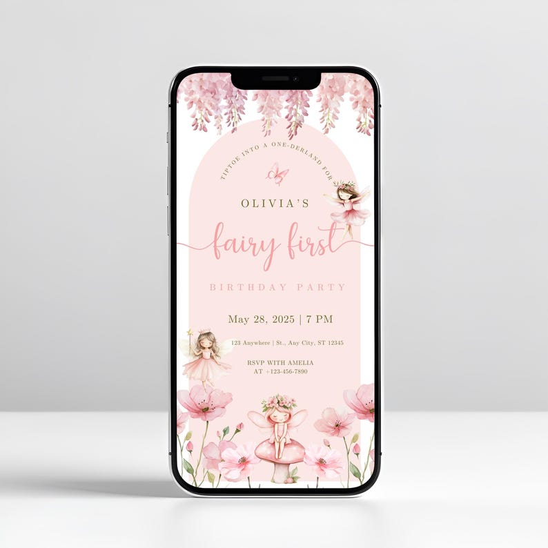 May include: A smartphone displays a pink fairy-themed birthday party invitation. The invitation features the text "Olivia's fairy first birthday party" with floral and fairy illustrations. The date and time are also included.