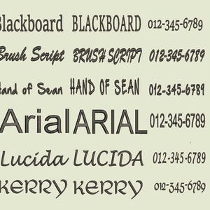 May include: A light beige background displays various font styles, including "Blackboard," "Brush Script," "Hand of Sean," "Arial," "Lucida," and "Kerry." Each font is shown twice, with a corresponding phone number. The fonts are in a dark gray color.
