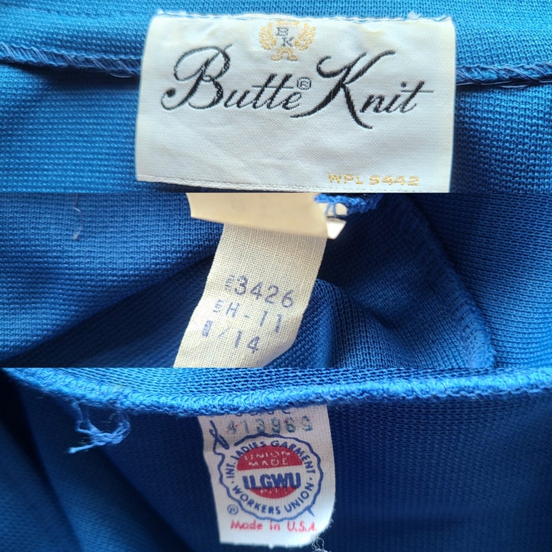 May include: Close-up of a vibrant blue garment with multiple tags. The top tag reads "Butte Knit" with a gold emblem. Additional tags display numbers and the "ILGWU" union label, indicating it was made in the USA.