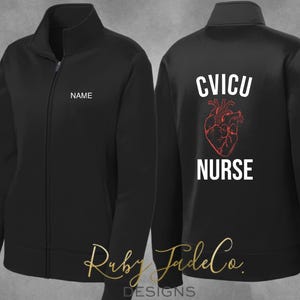 May include: Black fleece jacket with a zipper closure. The front of the jacket has a space for a name. The back of the jacket has the text "CVICU NURSE" with a red anatomical heart graphic.