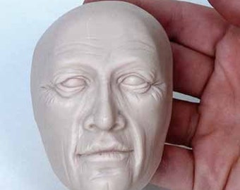 Moldf3 - 3 inch St. Nicholas-type face mold.  Serious Male Face, by Maureen Carlson