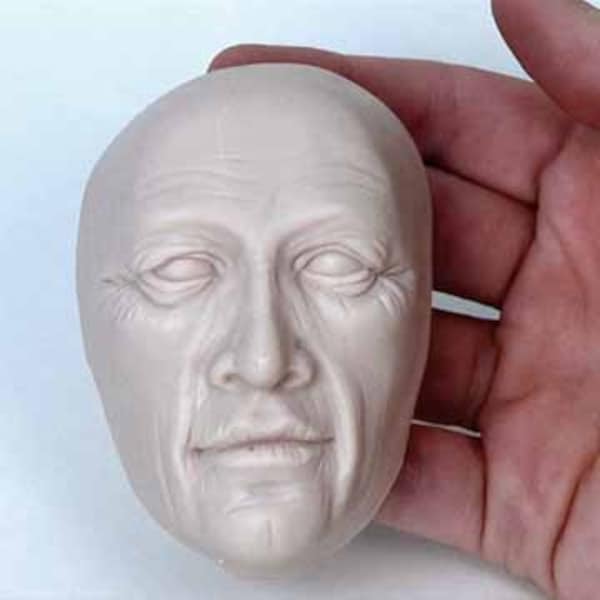 Moldf3 - 3 inch St. Nicholas-type face mold.  Serious Male Face, by Maureen Carlson