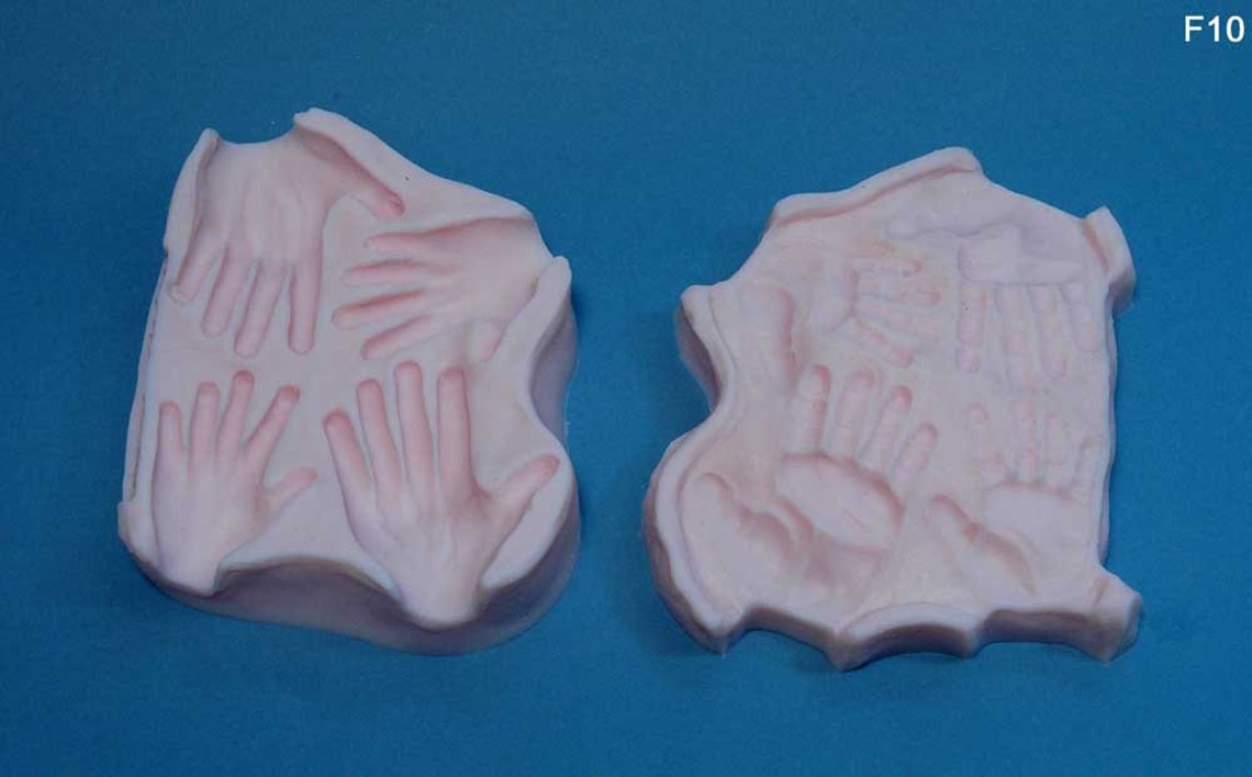 Moldf10 Hand Mold size 2inch to 1.75 inches long. Designed Etsy