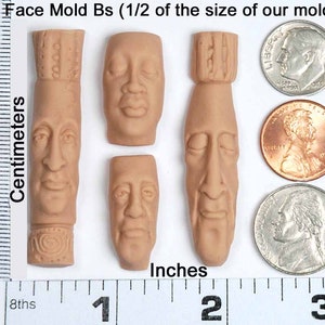 May include: Four silicone face molds for making miniature sculptures. The molds are beige and feature different facial expressions. The molds are shown next to a ruler and US coins for size reference.