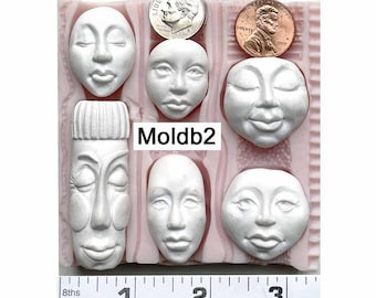 Moldb2 - 6 faces: 2- 1" round, 2- 1" long, 1 1/4" long, 1 1/2" stylized, Plus 5 Texture Designs by Maureen Carlson
