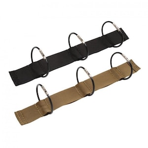 May include: Two black and tan fabric straps with metal rings. The straps are designed to hold keys or other small items.