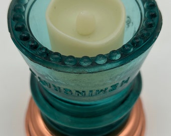 Aqua glass insulator votive candle holder