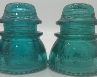 Vintage aqua colored Hemingray 42 glass insulator