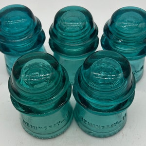 Vintage aqua colored Hemingray No. 16 glass insulator