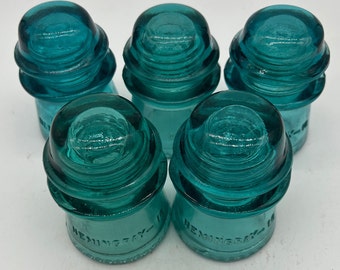 Vintage aqua colored Hemingray No. 16 glass insulator