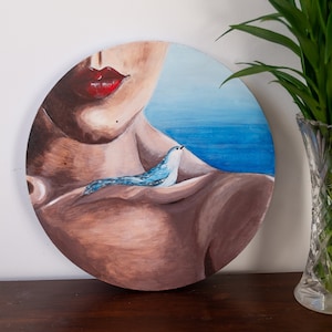 Original art. Acrylic painting &quot;Closeness&quot;. Blue bird and a woman. Round canvas painting, 30cm diameter. Red lips and blue bird. Seaside.