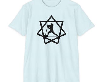 May include: A light blue t-shirt with a black silhouette of a person holding a microphone inside a six-pointed star.