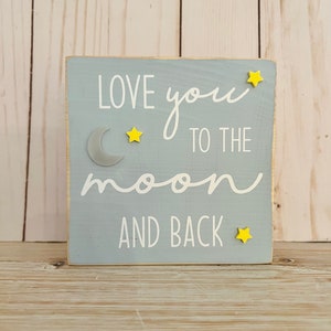 i love you more to the moon and back wood sign