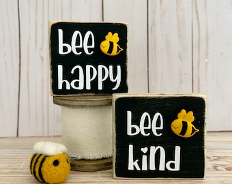 Mini carteles con la frase "Abeja feliz, abeja amable"